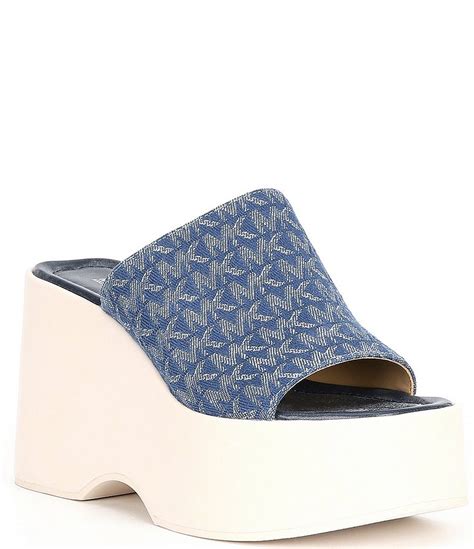 michael kors dabney platform slides|MICHAEL Michael Kors Women's Dabney Logo Platform Slide .